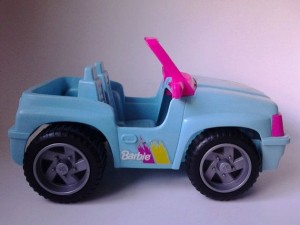 Yes, my car obsession began young. Barbie  enjoyed jaunts to the shore in this sweet Jeep.